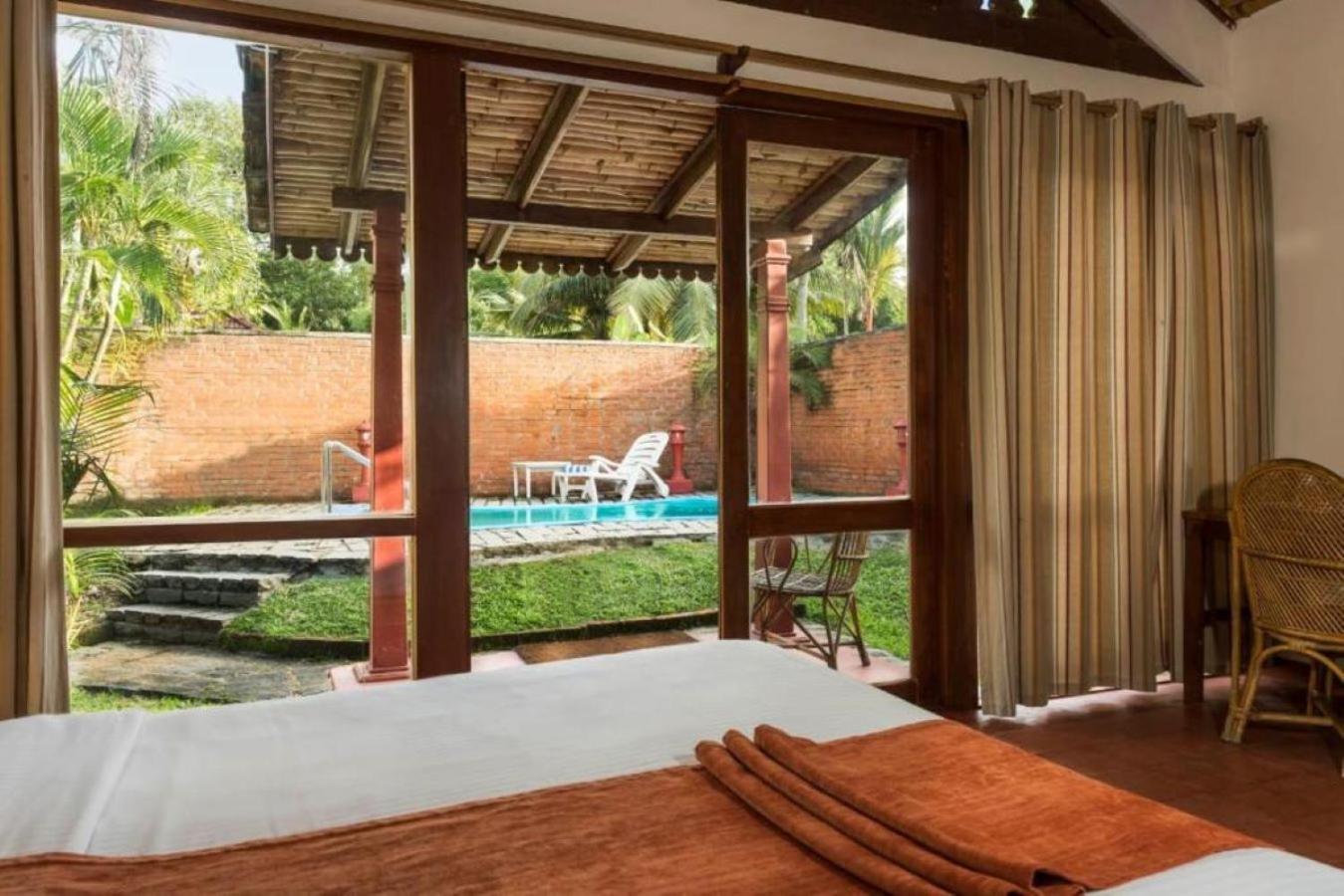Abad Whispering Palms Hotel Kumarakom Kültér fotó