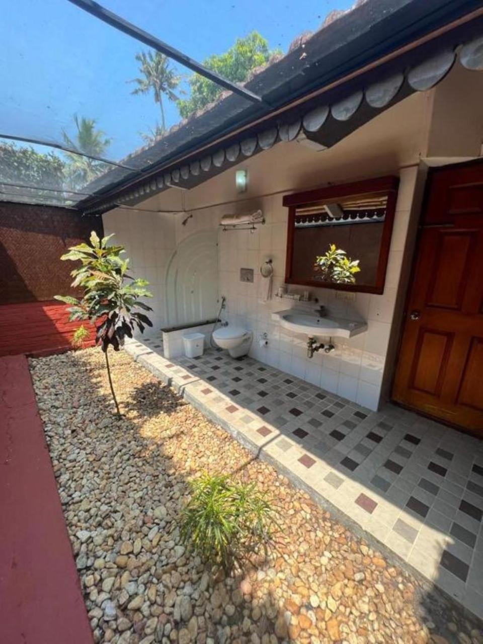 Abad Whispering Palms Hotel Kumarakom Kültér fotó